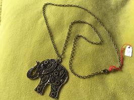 Collier bijoux bronze motif éléphant