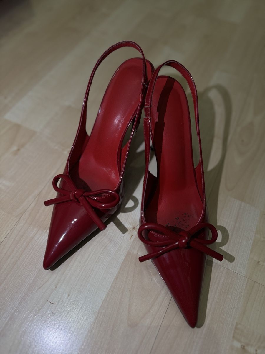 SLINGBACK WITH BOW IN BLACK LAMBSKIN