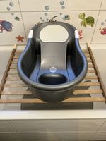 Baby Badewanne und Holzbrett