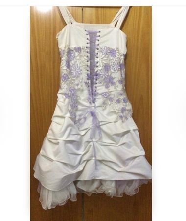 Magnifique robe de fête taille 10 ans acheté 390.- neuf