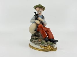 Capodimonte Porzellanfigur Junge mit Dudelsack, handbemalt