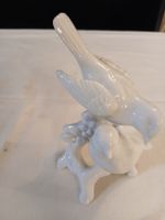 Groupe d'oiseaux en porcelaine blanche