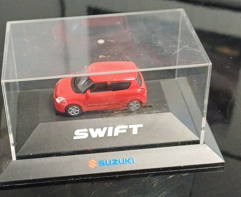 Suzuki Modellini d'auto: Suzuki Swift Modellauto – Nuovo e nell'imballaggio originale da Neuenhof venduto da GarageMatterAG1964