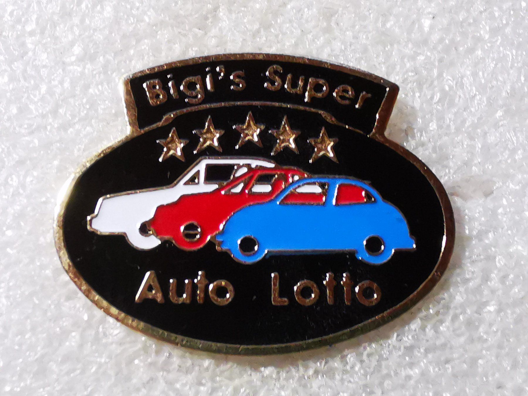 Placchette & Badge: Ansteckpin 92: Bigi's Super Auto Lotto – Usato da Oppligen venduto da Pin-Fall-Shop