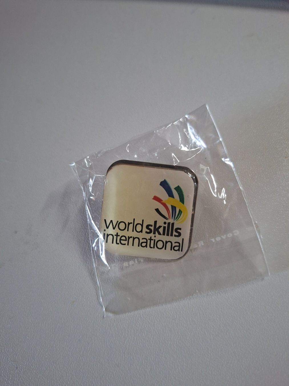 Placchette & Badge: World Skills International Pin – Nuovo e nell'imballaggio originale da Erlinsbach venduto da pfunky