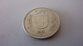 Verschobene Randinschrift: 5 Fr. 1931,10*Sterne über Gesicht