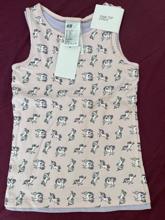 Lot 2 débardeurs H&M licornes rose taille 122/128 neuf