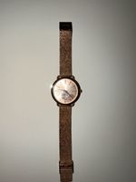 Montre femme Michael Kors or rose bon état