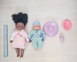 2 Puppen inkl Kleider und Accesoires ca. 30cm + 25cm