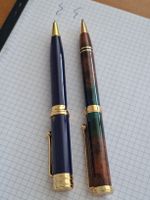 2 Kugelschreiber, blau und mehrfarbig, goldfarbene Details
