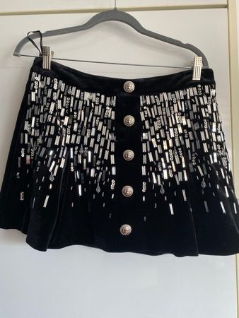 Minirock schwarz Samt mit Pailletten Grösse M