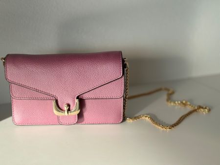 COCCINELLE "Ambrine" crossbody bag in "Acai" pink