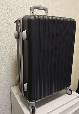 Schwarzer Hartschalenkoffer Trolley Grösse M