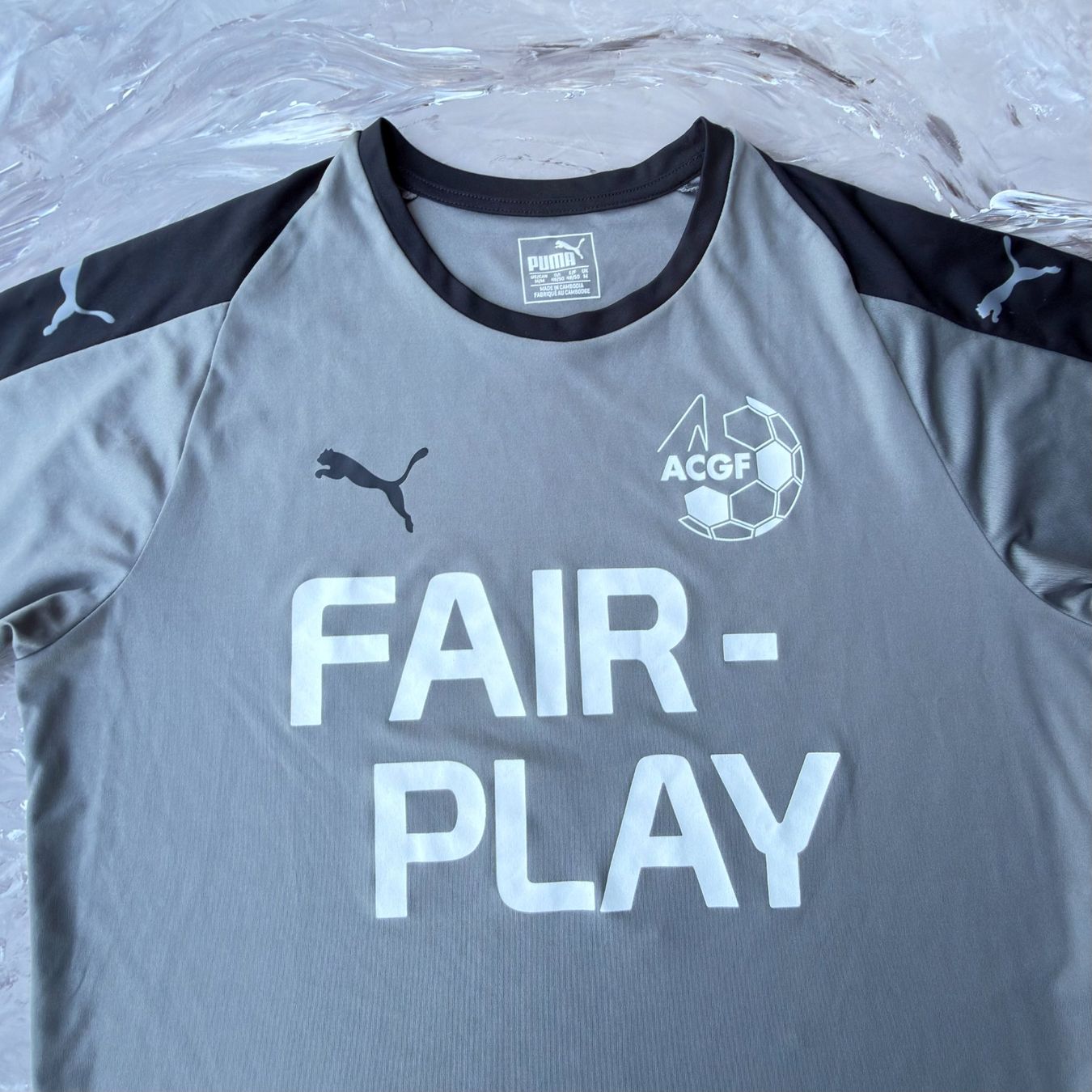 Puma T-shirt: T-shirt Puma ACGF Fair Play gris – Usato da Thônex venduto da Suisse.Shopping 2