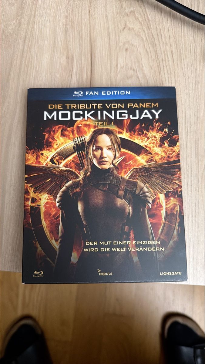 Tutti i DVDs: Tribute von Panem - Mockingjay Teil 1, Blu-Ray Fan Edition – Nuovo (secondo la descrizione) da Rickenbach SO venduto da martink79