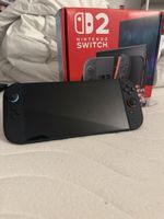 Console Nintendo Switch 2 OLED + Jeux + Manette Pokemon