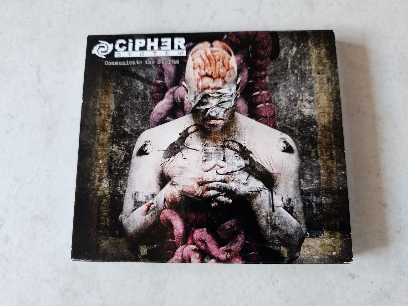 CD: Cipher System  -  Communicate The Storms – Usato da Schneisingen venduto da backstore24