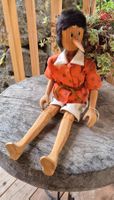 grosser Pinocchio aus Holz Structura Schweizer Handarbeit