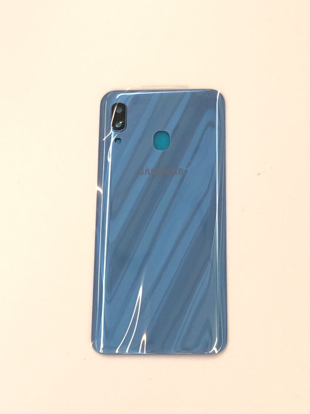 Samsung Telefoni cellulari / Smartphones: SAMSUNG Galaxy A20 Akkudeckel blau – Nuovo e nell'imballaggio originale da bern venduto da reptechnic