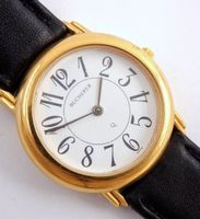 Bucherer Damenuhr, elegante goldene Uhr mit Lederarmband.