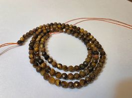Tigerauge facettiert 3mm. Strang
