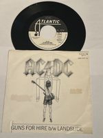 AC/DC. 1983. Guns For Hire / Landslide