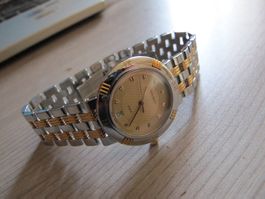 Nina Ricci Paris Swiss Made Damenuhr Quartz Stahl-Gold Läuft