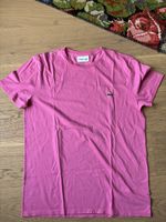T-shirt Lacoste rose Taille M - État impeccable!