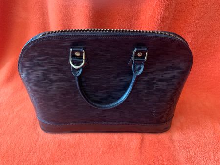 SAC  LOUIS VUITTON Alma en cuir épi de couleur Noire