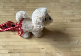 Chien en peluche beige avec laisse rouge bon état