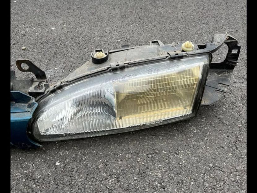 Fari: Ford Mondeo Scheinwerfer mit Grill JG 1994 – Usato da Rothenhausen venduto da Deltassion 2