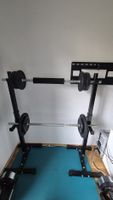 Hantelbank mit Hantelstangen und Gewichten 50kg ab 1.-