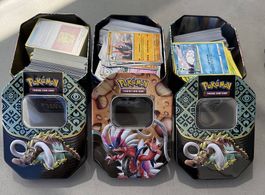 3 Pokémon Tins + jede Menge Bulk