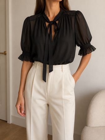 Bluse schwarz Grösse 40 mit Schleife guter Zustand