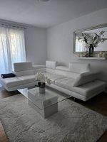 Grand Canapé  en cuir blanc 