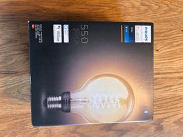 PHILIPS Hue White E27 550 Lumen 2100K NEU