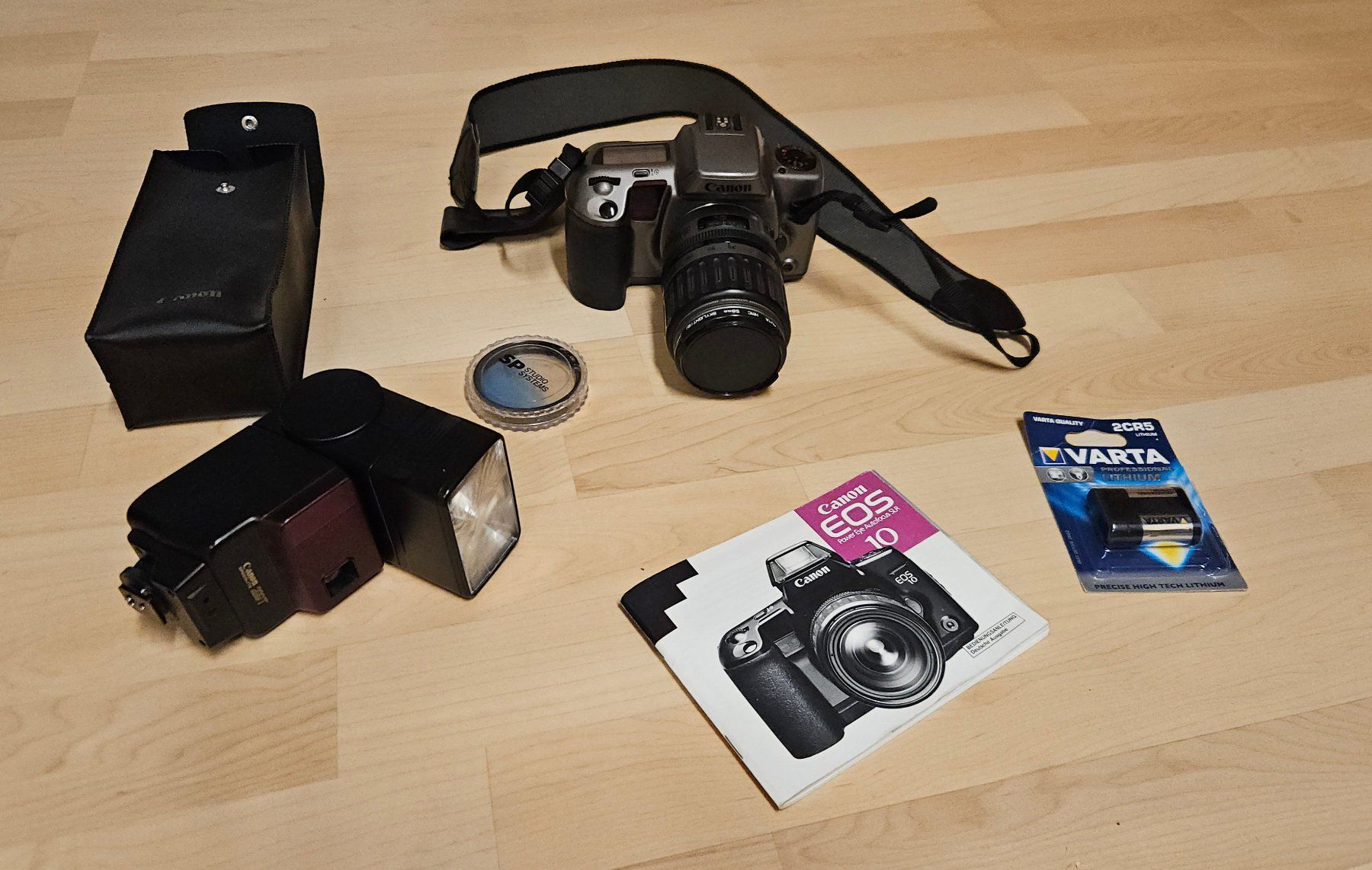 Canon Fotocamera: Canon EOS 10 Obj.35.135mm Blitz Can.Speedlite 299T – Usato da Zwillikon venduto da Funfun