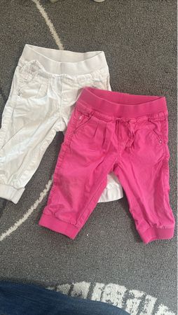 Rosa und weisse kurze Hose (bis zum Knie)  OBAIDI. GR 94