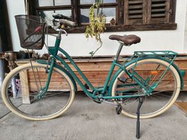 Citybike Elops grün mit Korb