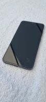 Smartphone Samsung Galaxy S23 schwarz mit vier Hüllen