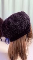 Schwarze Strickmütze mit Glänzenden Details