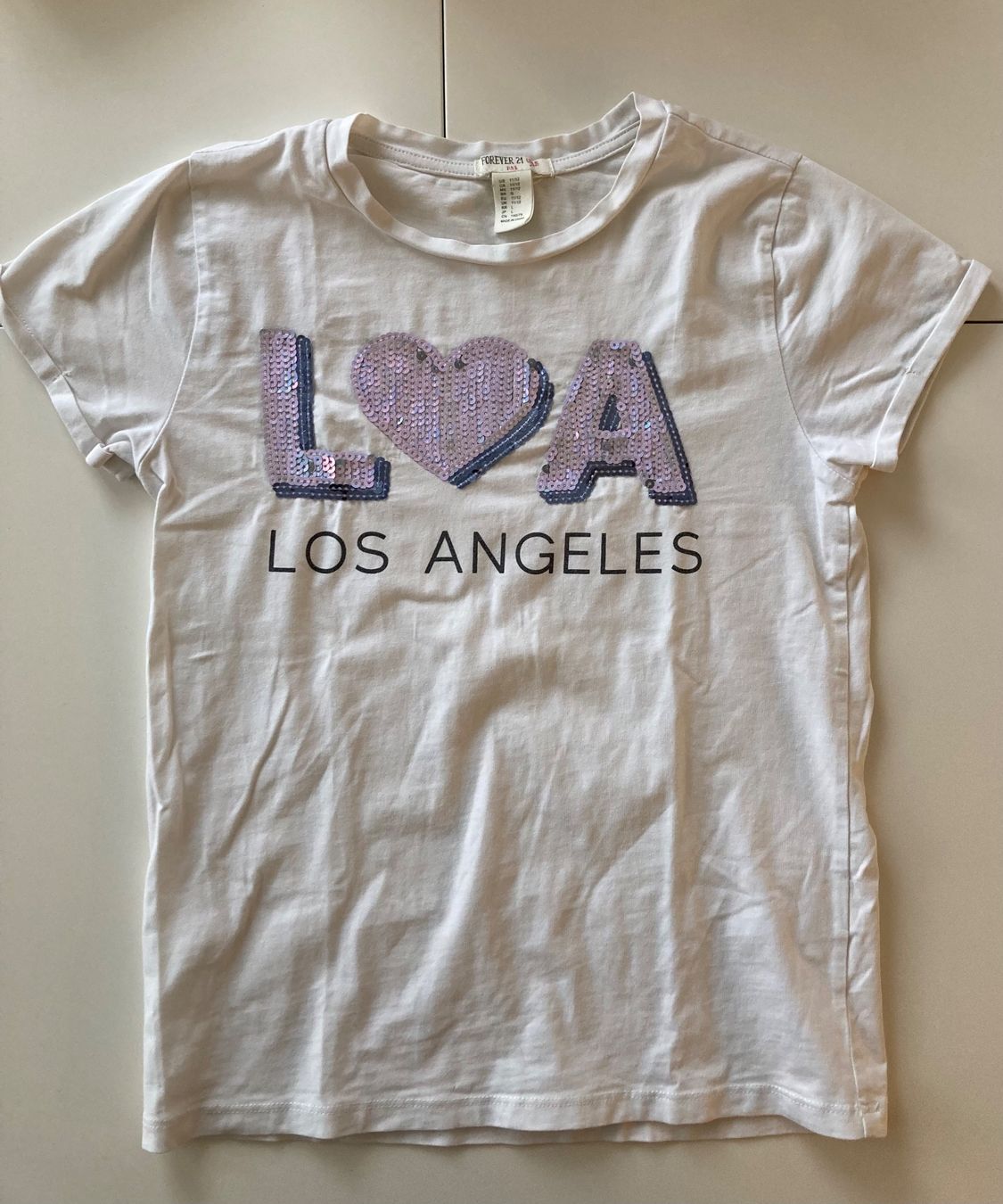 Blusen, T-Shirts & Tops: T-shirt fille 7-8 ans – Gebraucht aus Bernex von mar_82vn 1