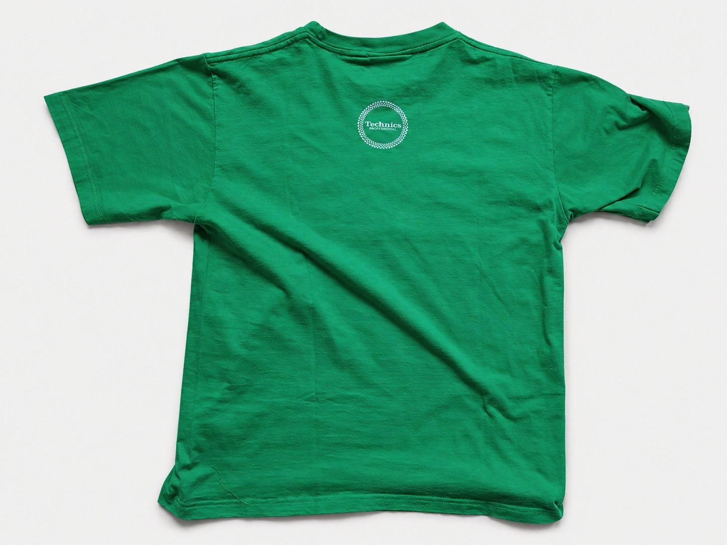T-shirt: T-shirt Technics Professionnal green TBE – Usato da Farvagny-le-Grand venduto da LaCaverne 1