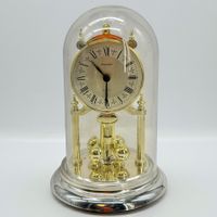 Horloge Staiger quartz vintage en plastique globe en lucite