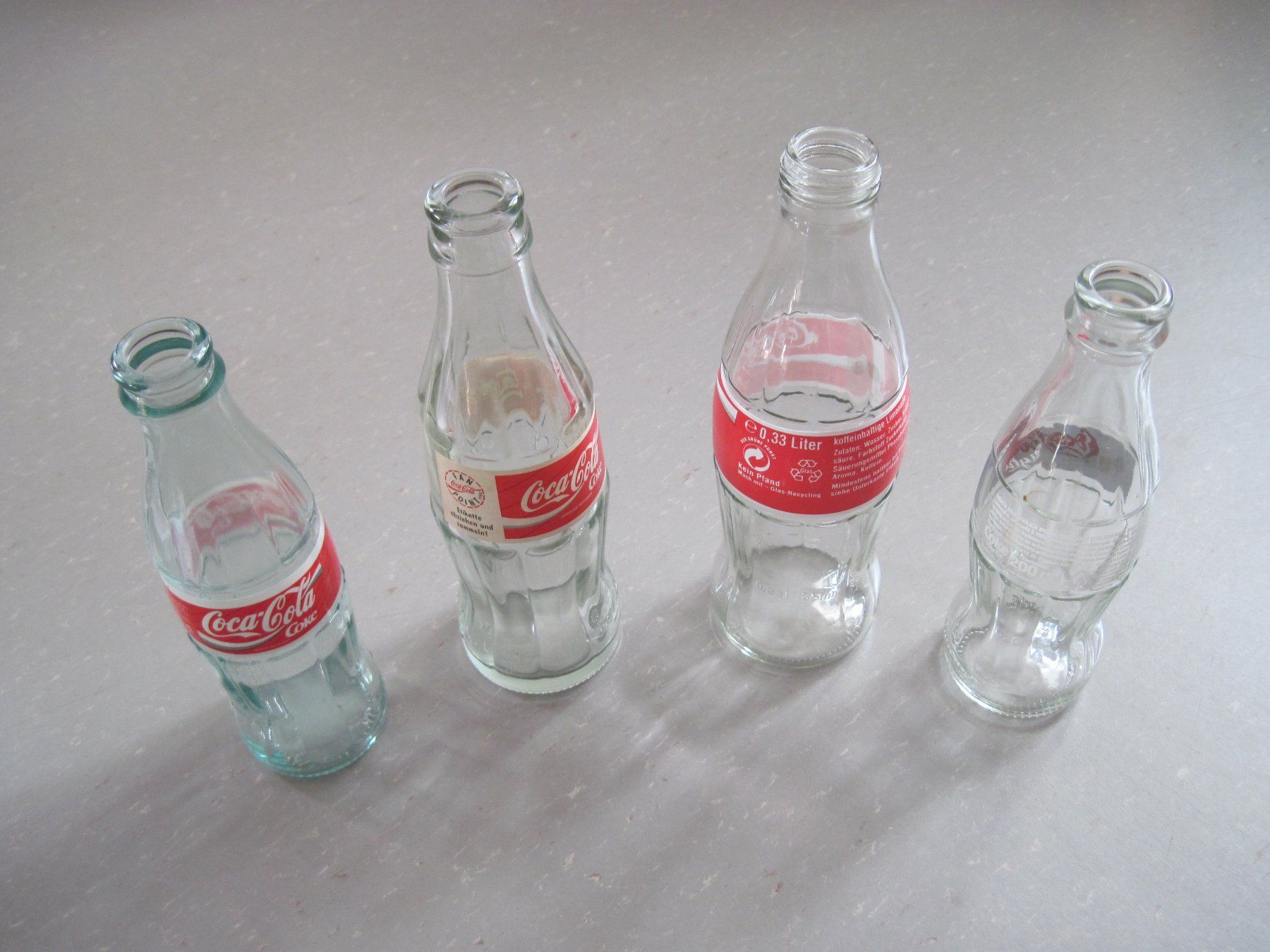 Coca-Cola Borracce & Thermos: Coca Cola Flaschen 4 Stück – Usato da Feuerthalen venduto da mam_5l7b