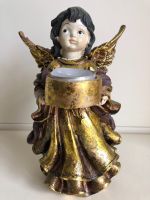 Figurine ange avec bougeoir en céramique