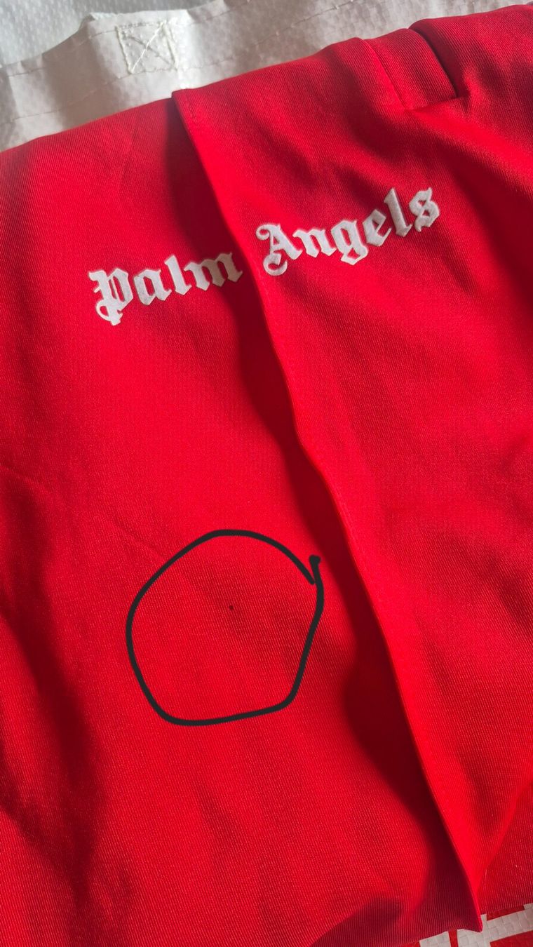 Palm Angels Pantaloni: Palm Angels red tracksuit pants – Usato da Lugano venduto da Ceruttig 1