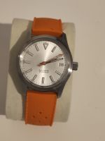 Montre automatique cadran argent bracelet orange 