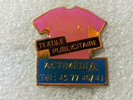 Ansteckpin 128: Actimedia