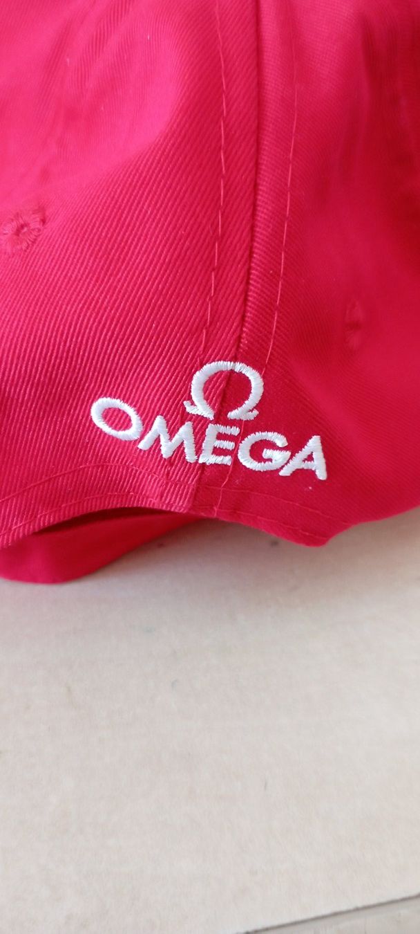 Copricapi, berretti & cappellini: originales Cap OMEGA Official Timekeeper Olympia 2026 – Nuovo (secondo la descrizione) da Pieterlen venduto da reisekultur 1